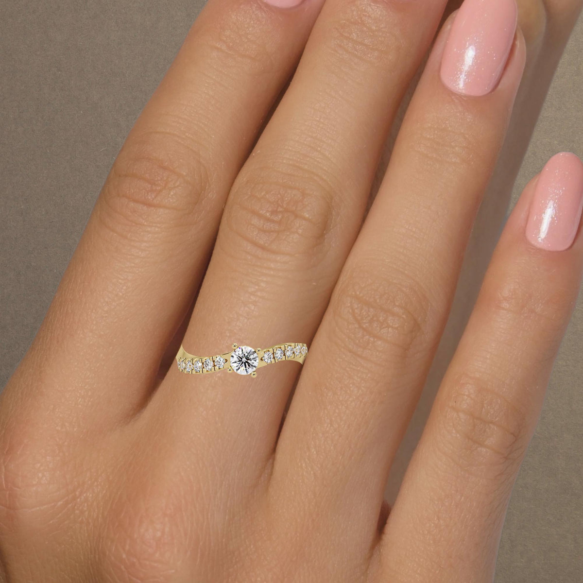 0.45 ctw lab grown diamond wave ring showing 4mm round center diamond measurement, thin gold engagement ring