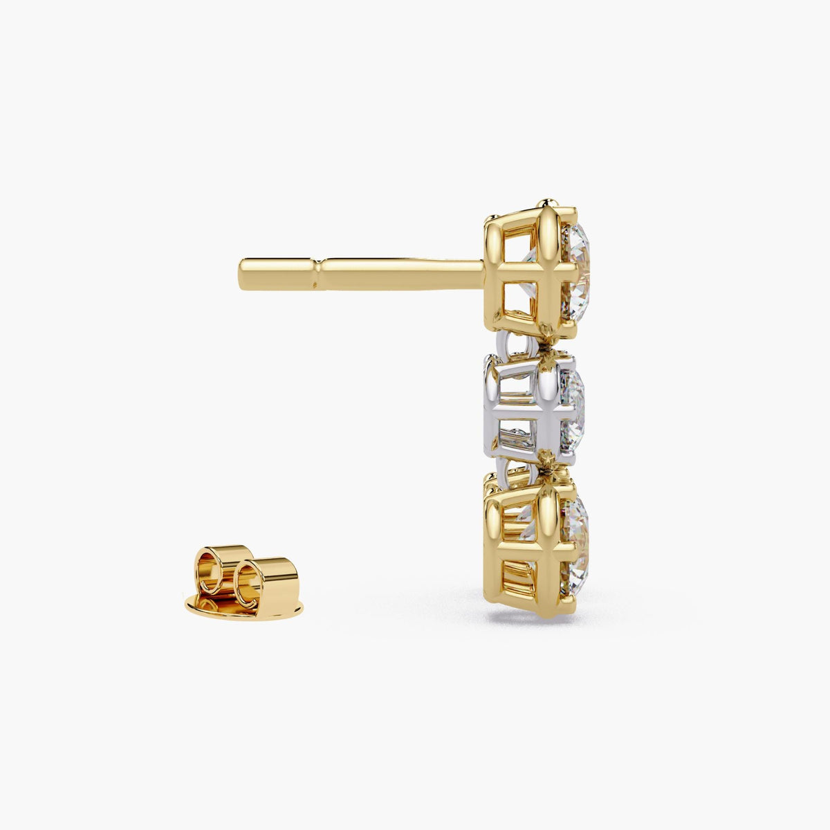 Side view of mixed metal diamond drop stud earring showing eight-prong crown settings, open gallery construction, and push-back closure in two-tone gold