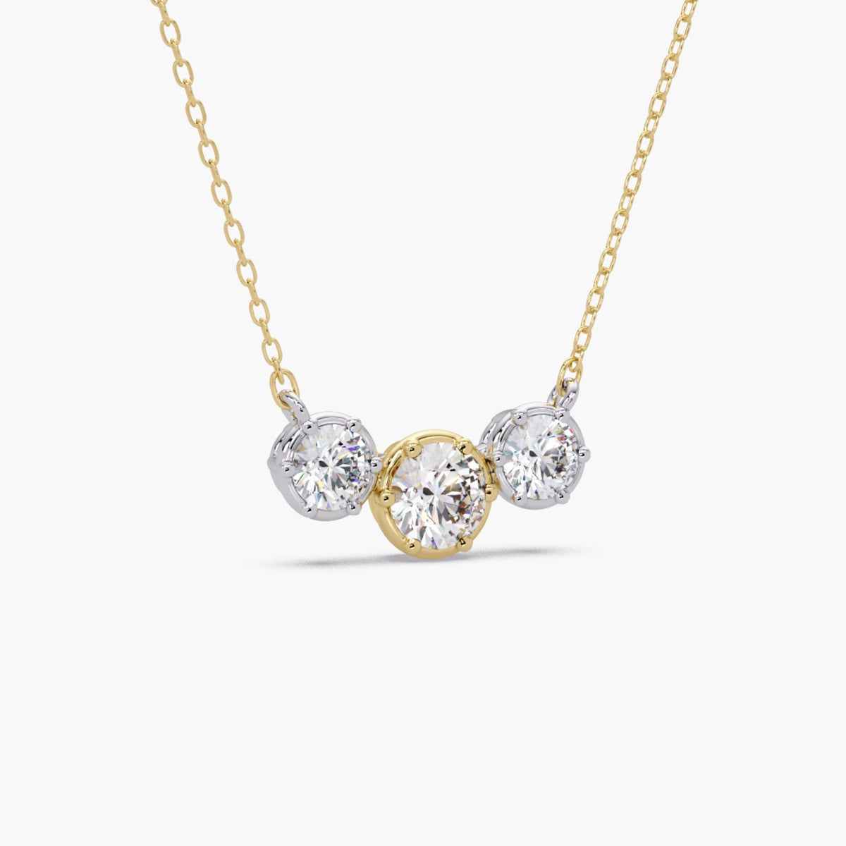 Three stone lab diamond necklace on 14K gold chain with mixed metal crown prong settings