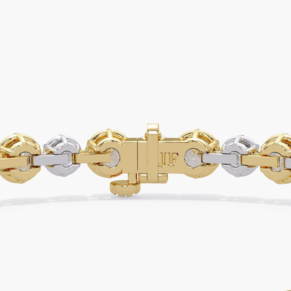 Alternating graduated lab diamond tennis bracelet showing 2.8mm and 3.5mm round diamonds in two tone 14K gold