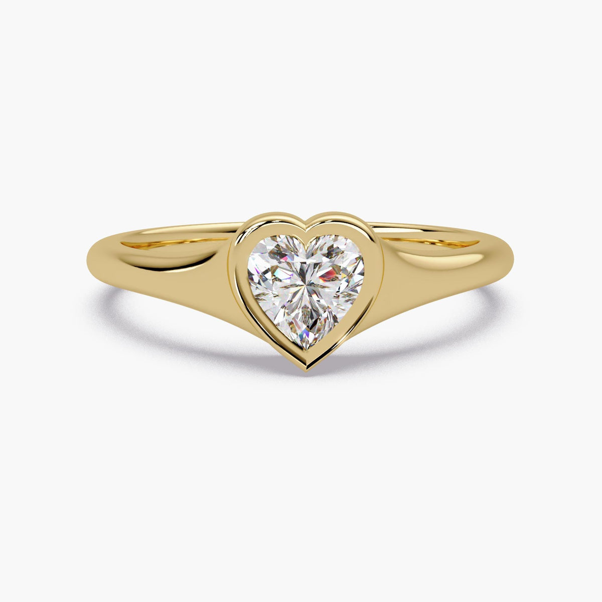 14K yellow gold bezel set heart lab diamond ring with a 0.50 CT heart cut solitaire, a minimalist pinky ring that works as a Valentine’s Day gift, promise ring, or everyday stackable ring.