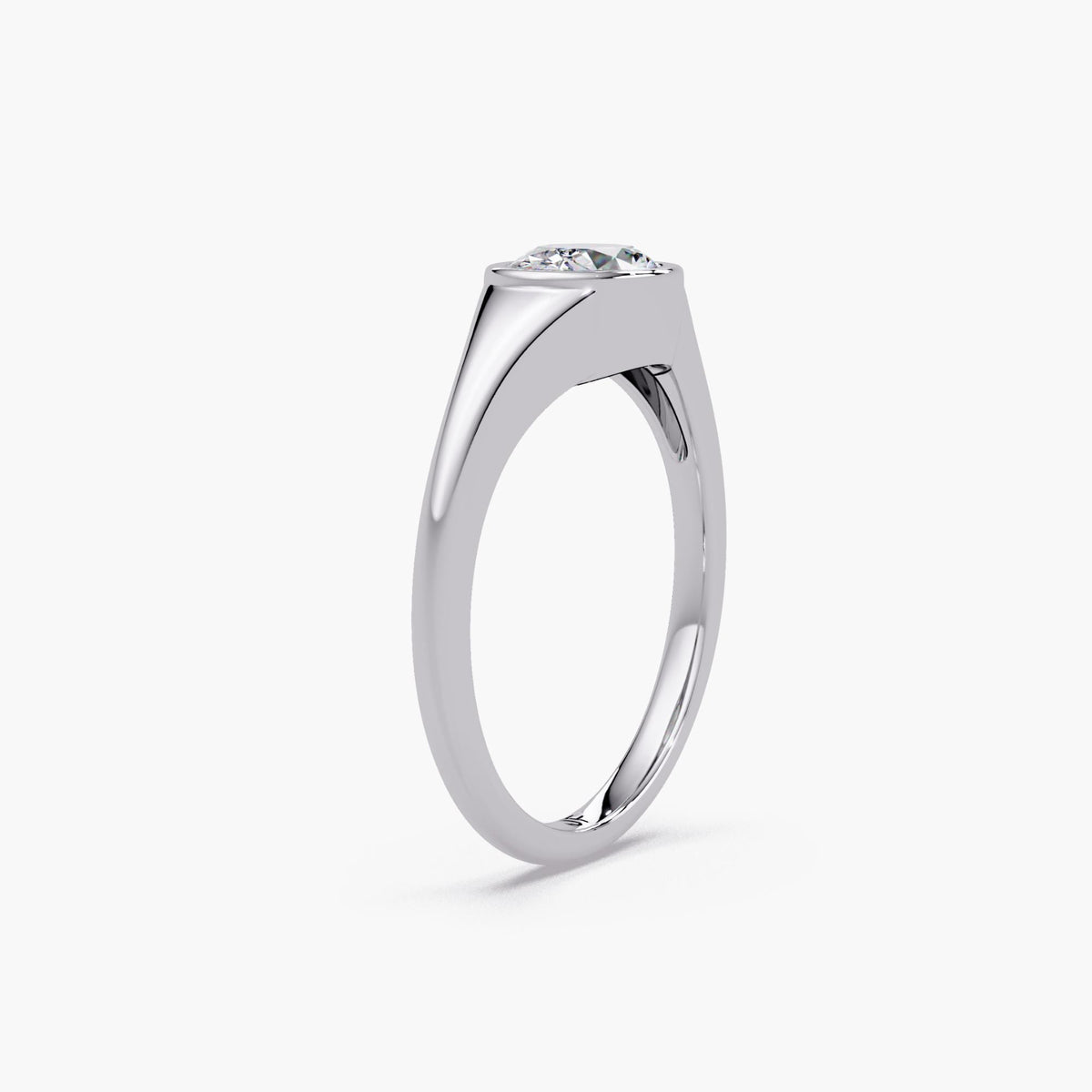 14K white gold bezel set oval lab diamond ring with a smooth tapered band, a minimalist oval solitaire ring for everyday wear, stacking, a promise ring, or a modern engagement ring.