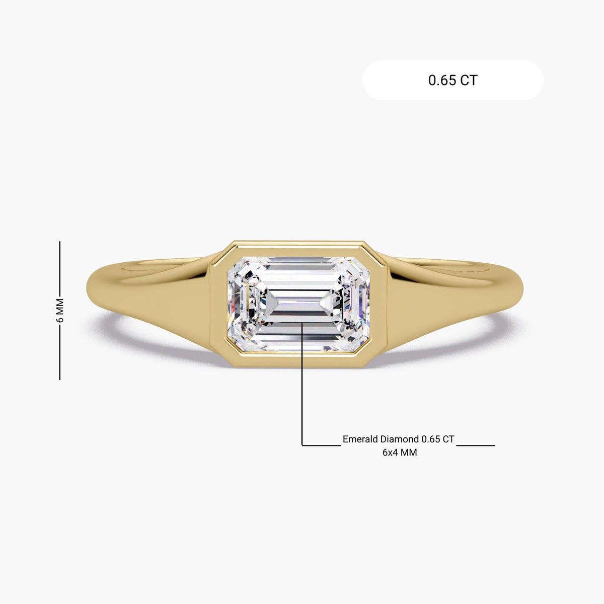 Emerald cut lab diamond signet ring in 14K yellow gold with a bezel-set center stone and smooth tapered band, styled as a modern pinky or statement ring for everyday wear.
