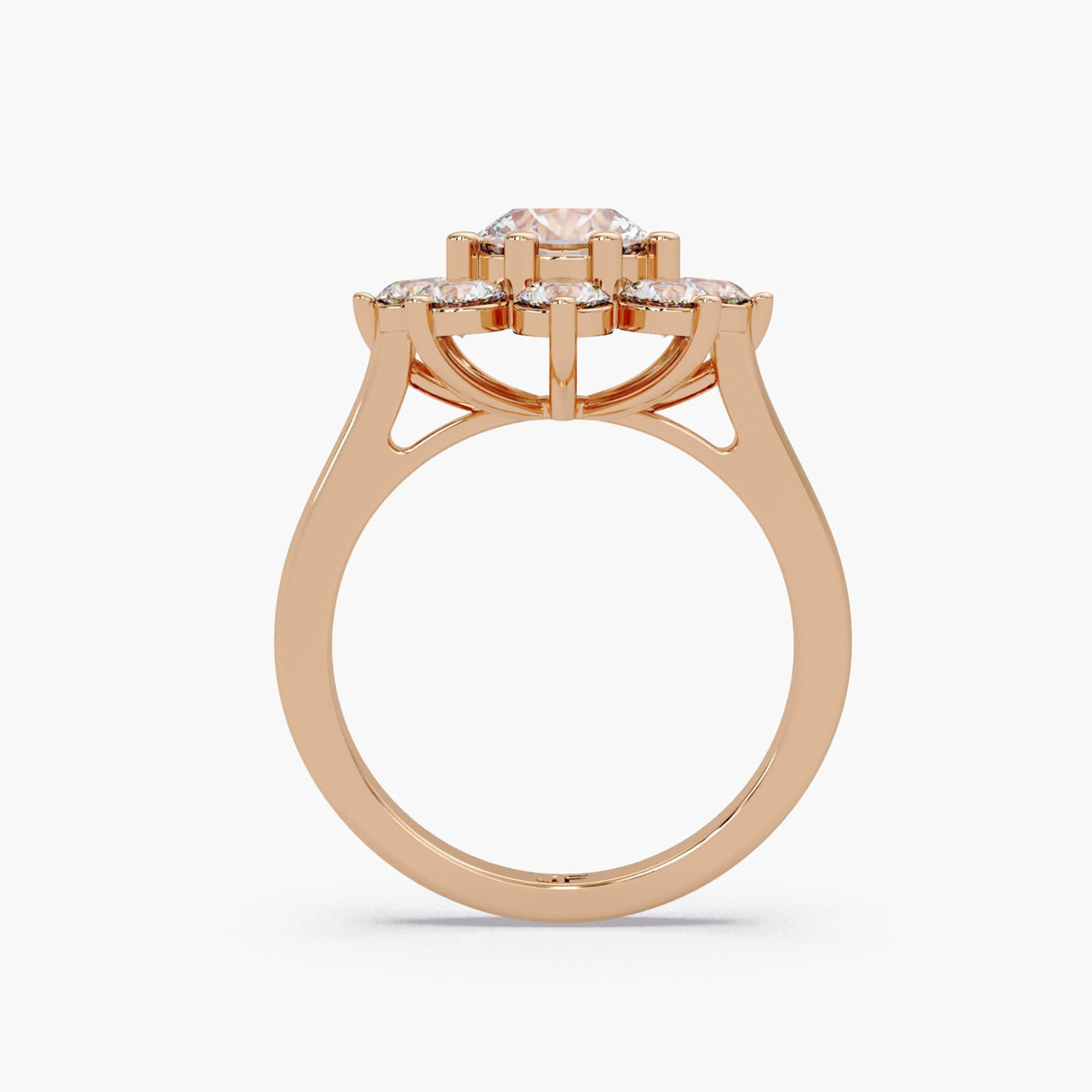 14K rose gold ring, featuring a warm, romantic pink hue that contrasts beautifully with the white lab-grown diamonds. The floral halo design takes on a vintage, feminine charm in this metal choice. It is a unique and heartfelt choice for a romantic proposal or a "push present."