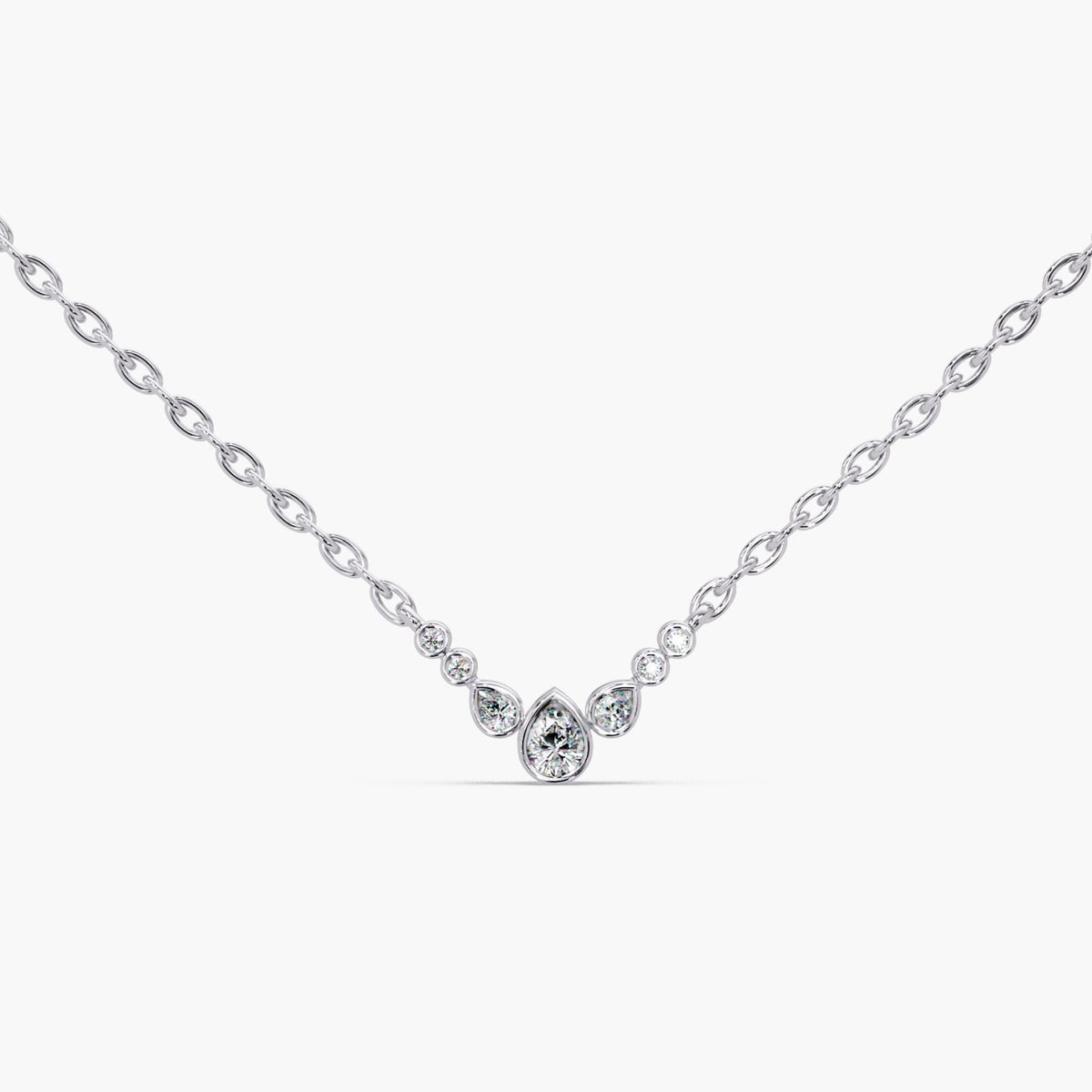 A dainty bubble diamond necklace crafted in solid 14K white gold. This pear cluster pendant features 0.20 CTW of lab diamonds on a 0.9 MM adjustable 16–18 inch chain. A minimal gold diamond necklace for everyday wear, layering, or a meaningful gift.