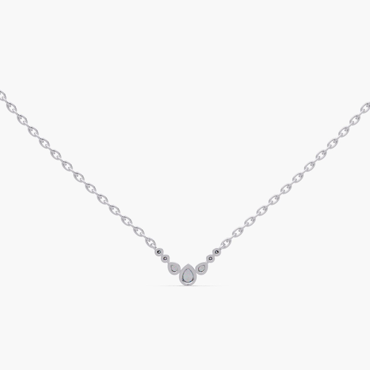 A dainty bubble diamond necklace crafted in solid 14K white gold. This pear cluster pendant features 0.20 CTW of lab diamonds on a 0.9 MM adjustable 16–18 inch chain. A minimal gold diamond necklace for everyday wear, layering, or a meaningful gift.