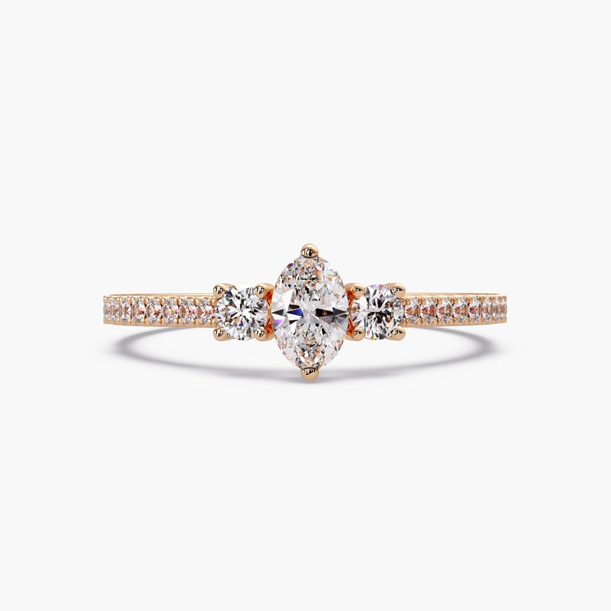 14K gold oval lab-grown diamond ring with three-stone design and pavé band.
A petite, low-profile diamond ring for promise, April birthstone, or meaningful gifting.
Clean, dainty diamond ring made for everyday wear