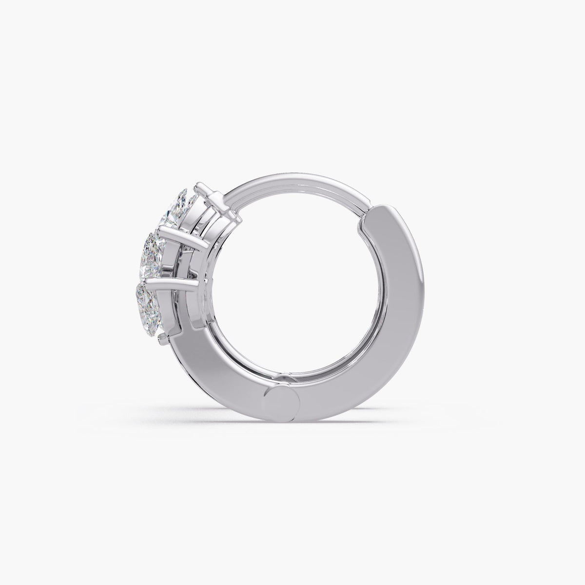 A pair of leaf huggie earrings crafted in solid 14K white gold, featuring marquise lab diamonds arranged in a leaf design cluster.
