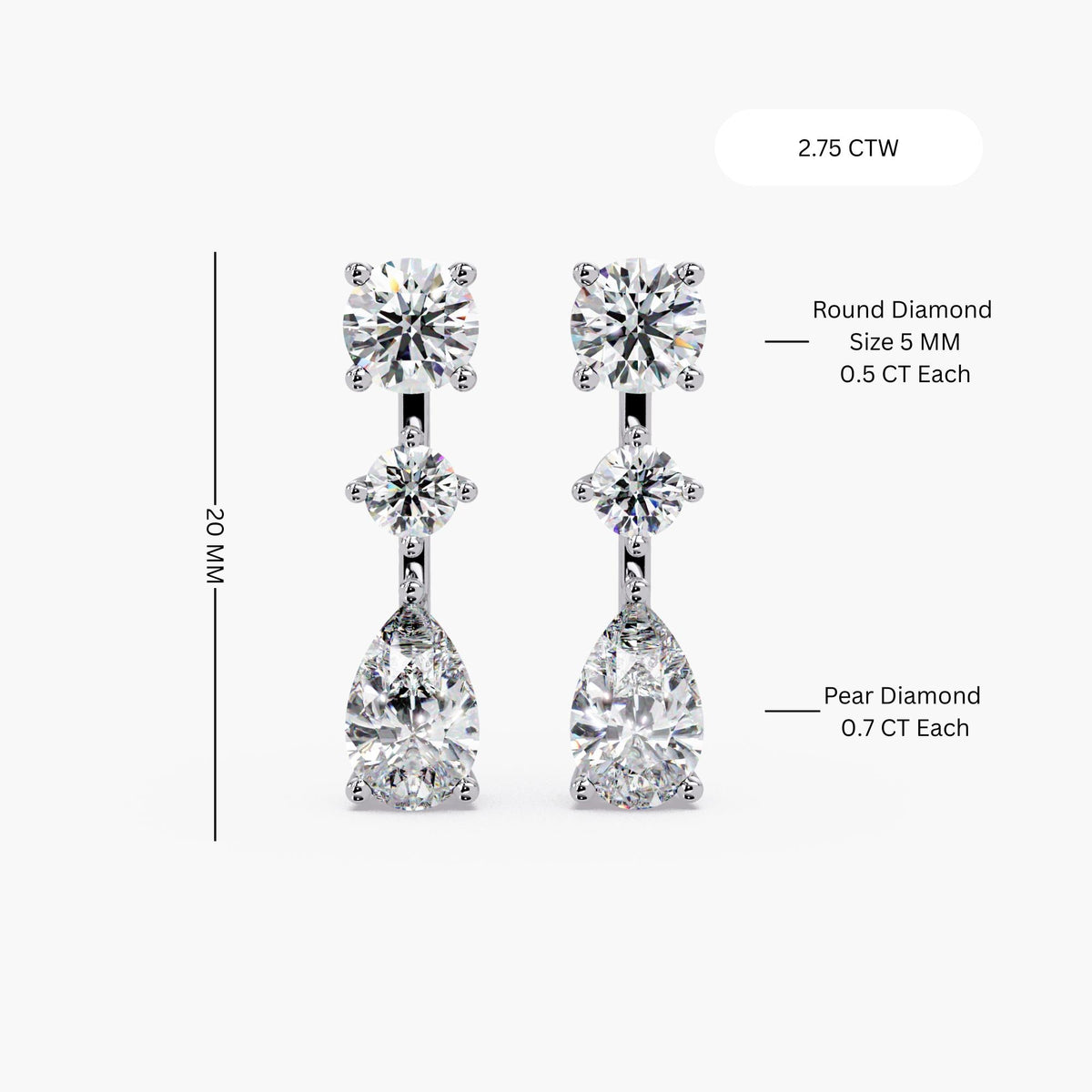 14K white gold lab grown diamond drop earrings worn on ear, featuring round stud top, center round diamond, and pear-shaped diamond drop in three-stone vertical design, 2.75 CTW