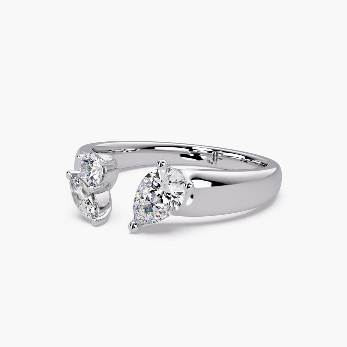 Multi shape lab grown diamond open ring in solid 14K gold featuring pear, round, and marquise stones in a sculptural wrap design.
Designed as a statement cigar band ring with a modern toi et moi feel, ideal for everyday styling or bold stacking.
A refined diamond ring for gifting, occasions, or a standout everyday piece.
