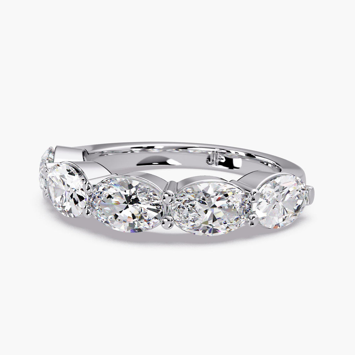 A showstopping east-west oval band, this 5-stone lab grown diamond ring features five 0.35 ct oval diamonds, creating an approximate 4mm diamond band across the finger.
This lab grown diamond anniversary band stacks effortlessly and makes a beautiful anniversary gift.
