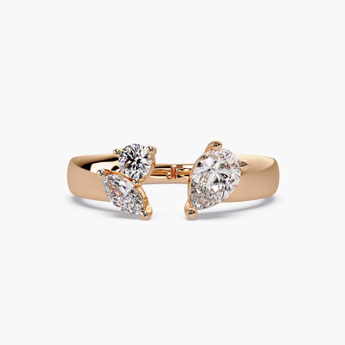 Multi shape lab grown diamond open ring in solid 14K gold featuring pear, round, and marquise stones in a sculptural wrap design.
Designed as a statement cigar band ring with a modern toi et moi feel, ideal for everyday styling or bold stacking.
A refined diamond ring for gifting, occasions, or a standout everyday piece.