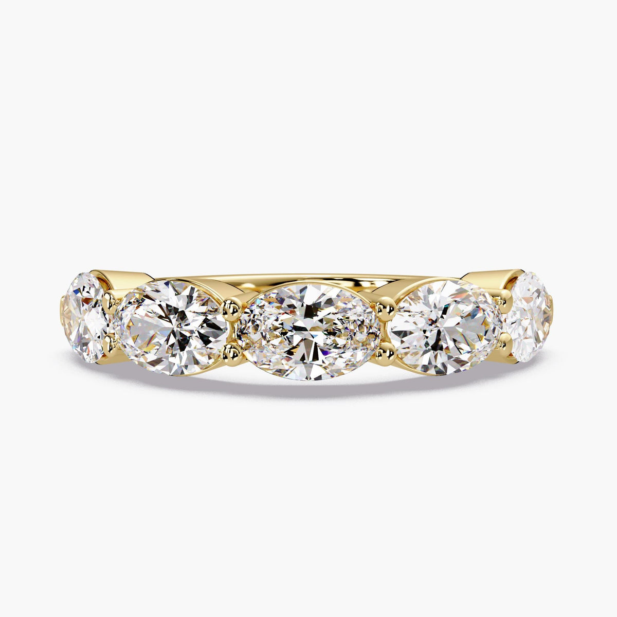 A showstopping east-west oval band, this 5-stone lab grown diamond ring features five 0.35 ct oval diamonds, creating an approximate 4mm diamond band across the finger.
This lab grown diamond anniversary band stacks effortlessly and makes a beautiful anniversary gift.