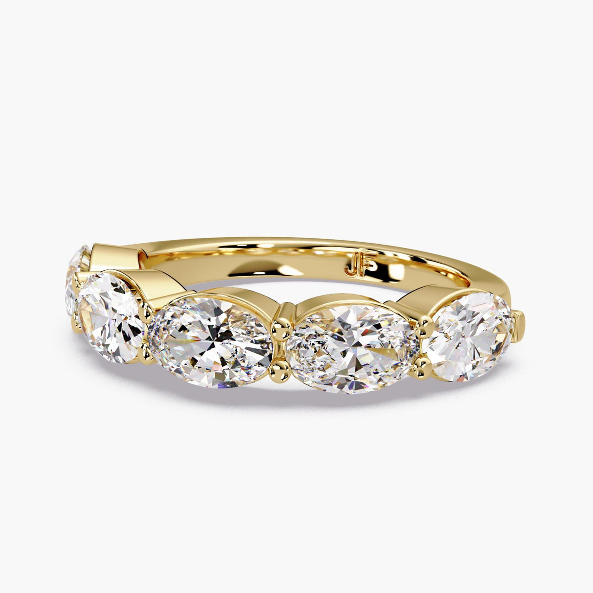 A showstopping east-west oval band, this 5-stone lab grown diamond ring features five 0.35 ct oval diamonds, creating an approximate 4mm diamond band across the finger.
This lab grown diamond anniversary band stacks effortlessly and makes a beautiful anniversary gift.