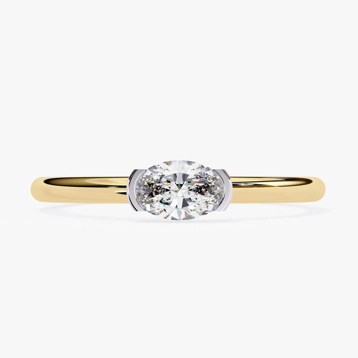 A gold ring with a large oval-shaped diamond set in the center.