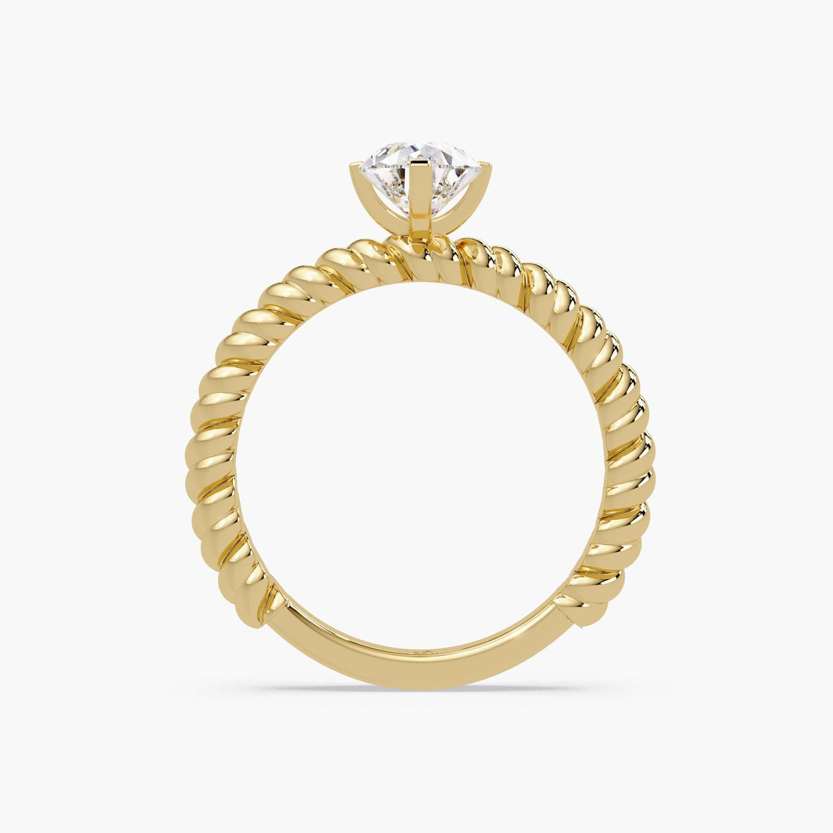 High-profile view of a yellow gold solitaire ring, showing the elevated setting of the diamond and the full thickness of the twisted rope band.