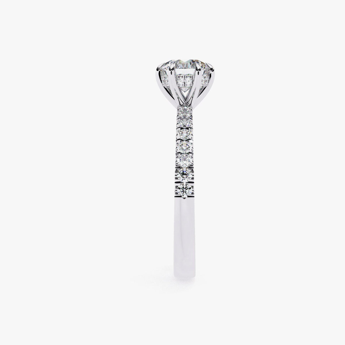 A close-up view of a diamond engagement ring with a large central diamond surrounded by smaller diamonds set in a silver band.