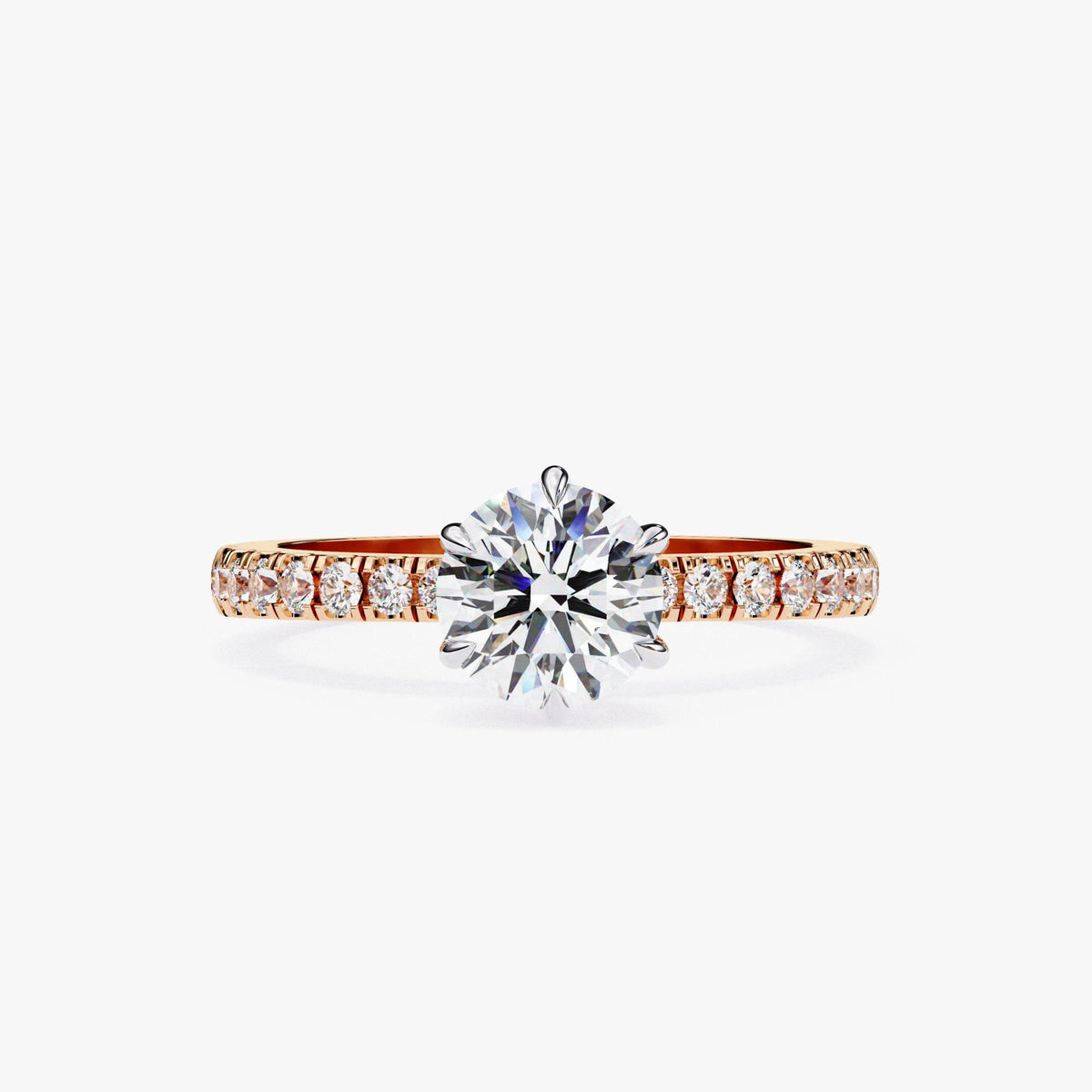 A diamond engagement ring with a large central diamond surrounded by smaller diamonds set in a rose gold band.