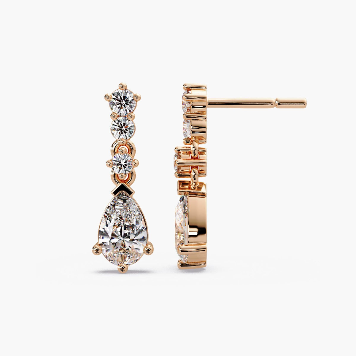 pear shaped diamond drop earrings / lab grown pear diamond earrings / statement diamond drop earrings / white gold diamond earrings / yellow gold diamond earrings / rose gold diamond earrings