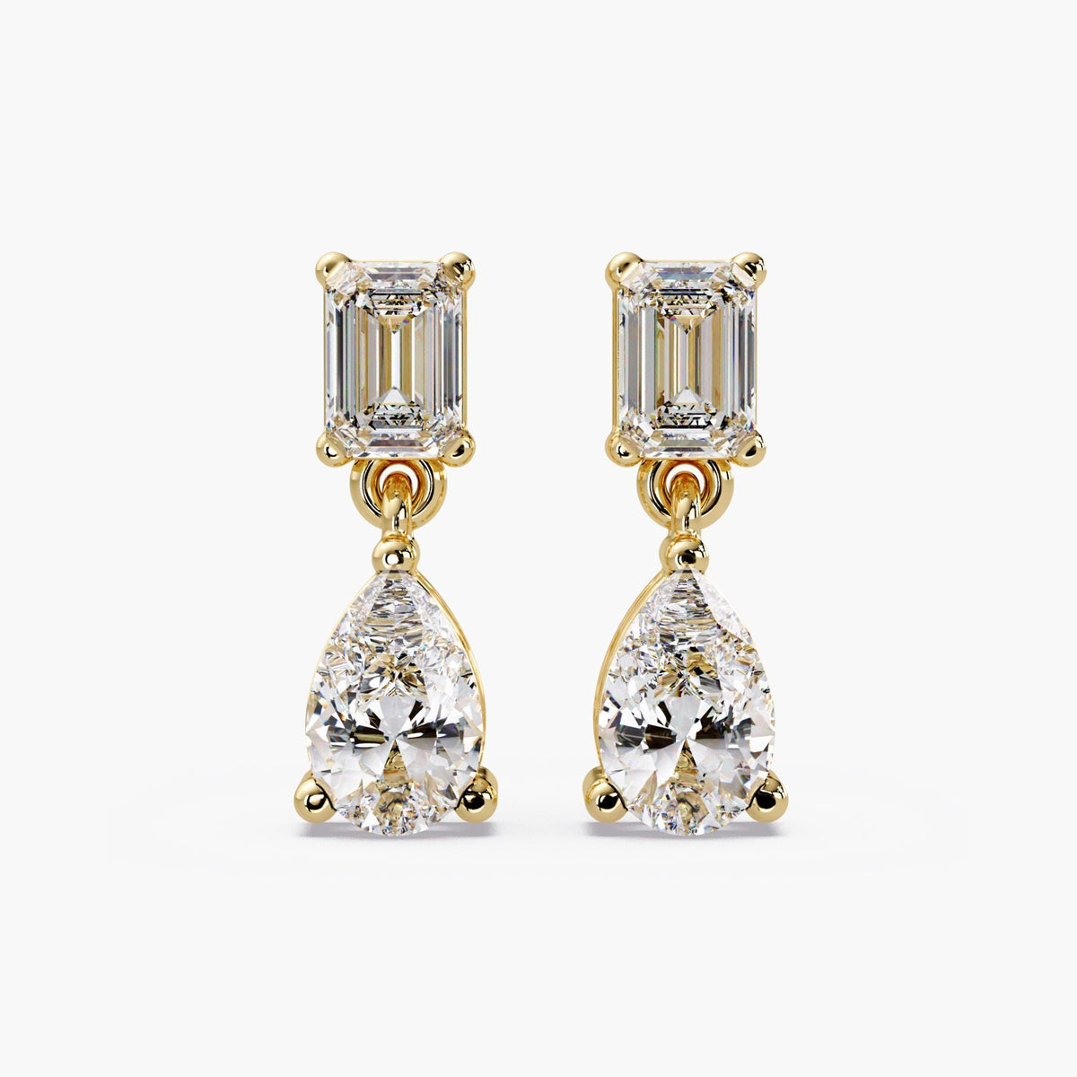 14K yellow gold lab diamond drop earrings with emerald cut stud and pear shaped dangle diamonds