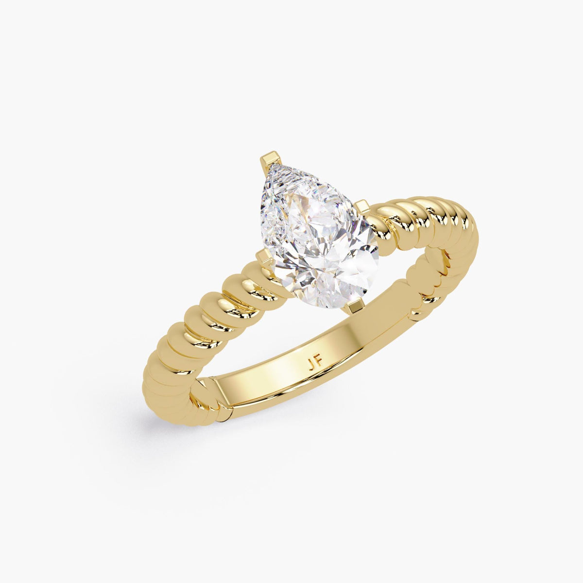 High-profile view of a yellow gold solitaire ring, showing the elevated setting of the diamond and the full thickness of the twisted rope band.