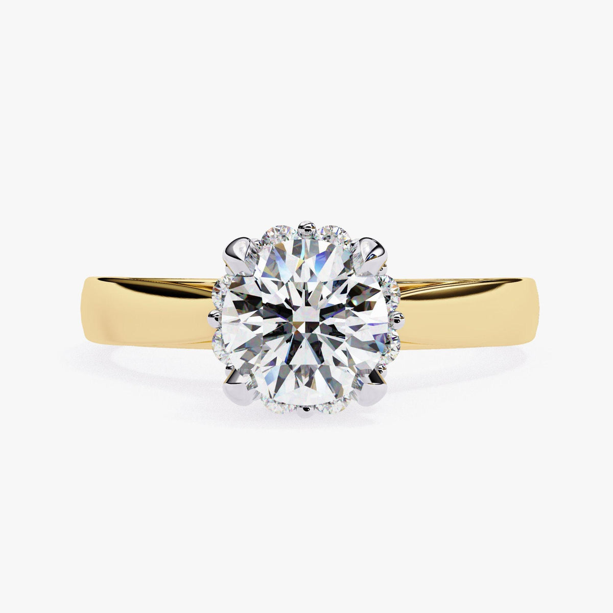 A gold ring with a large, brilliant-cut diamond at the center.