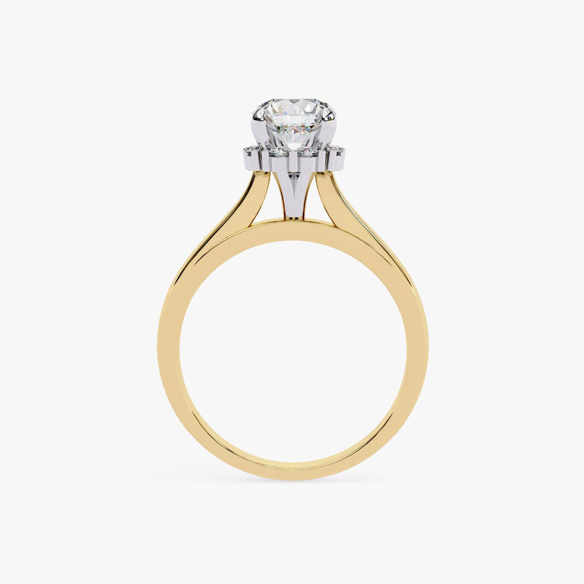 A gold engagement ring with a large diamond set in the center.