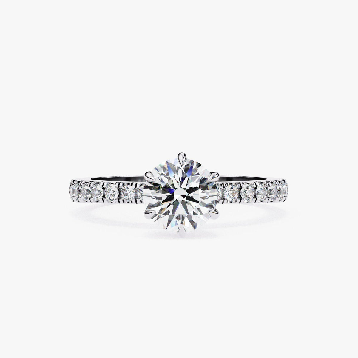 A diamond engagement ring with a large central diamond surrounded by smaller diamonds set in a band.