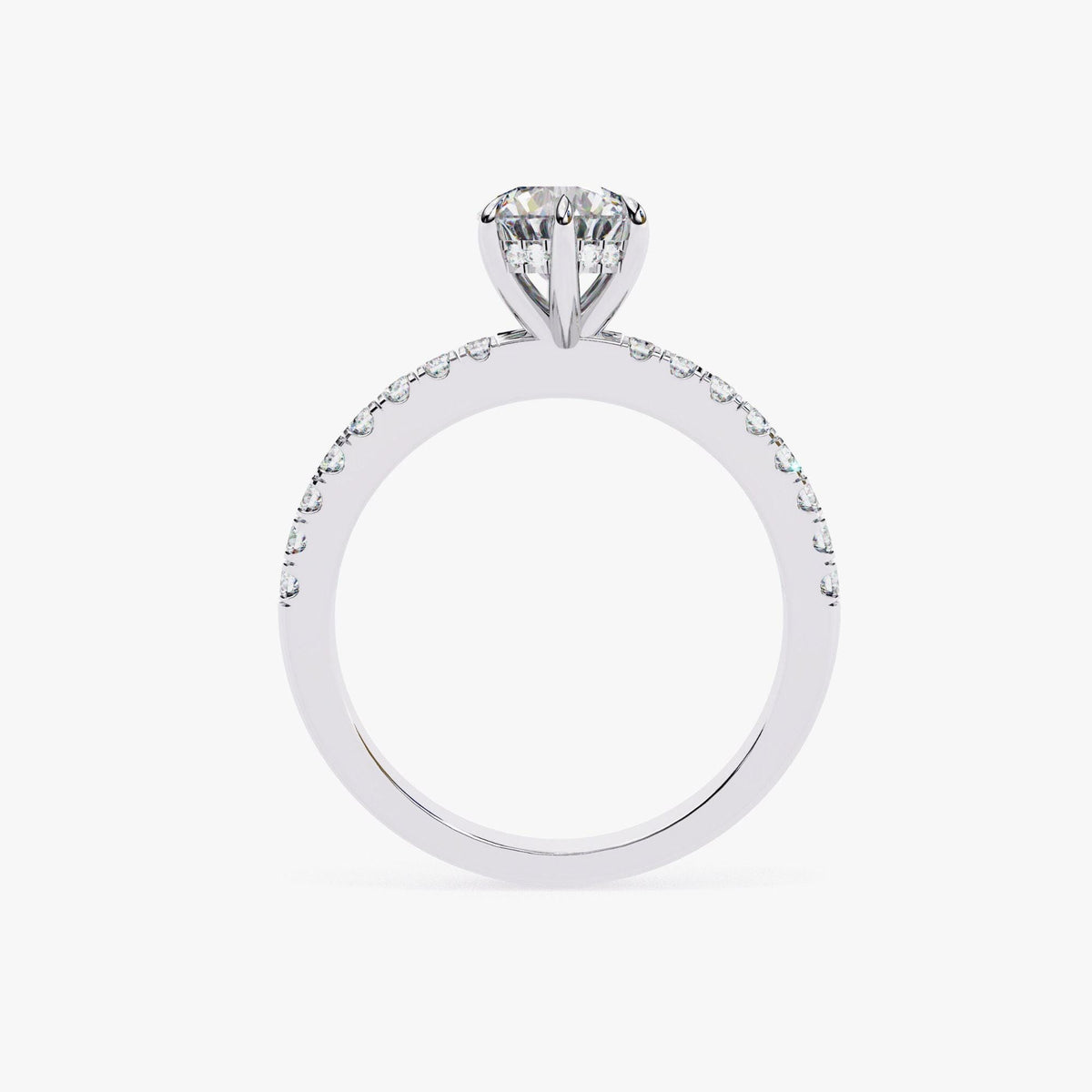 A silver engagement ring with a large diamond set in the center, surrounded by smaller diamonds along the band.