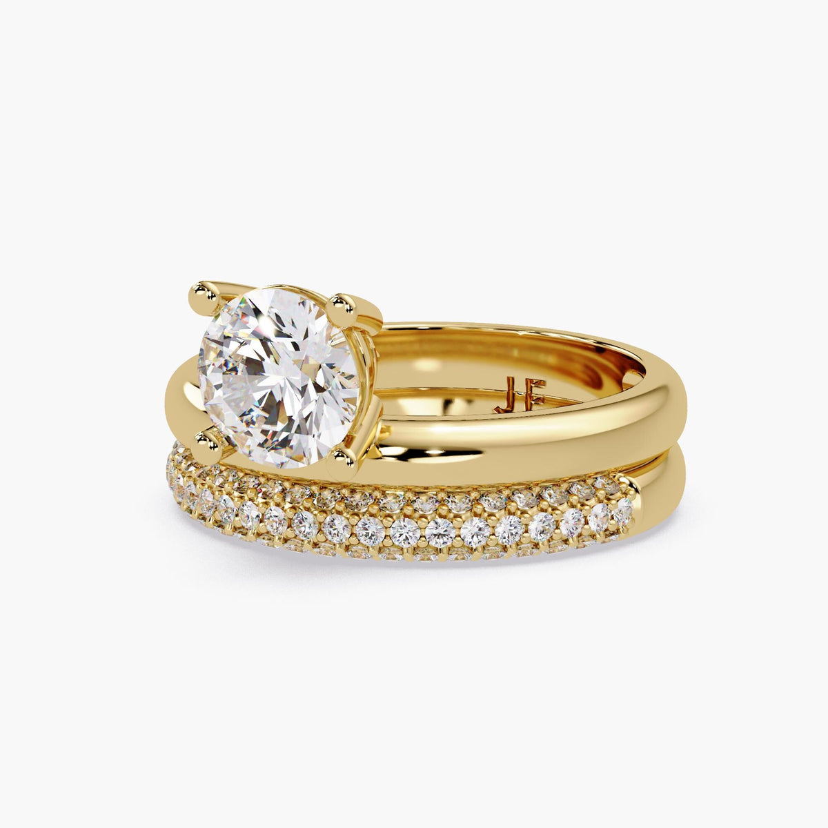 IGI certified round diamond bridal set with solitaire engagement ring and pavé wedding band