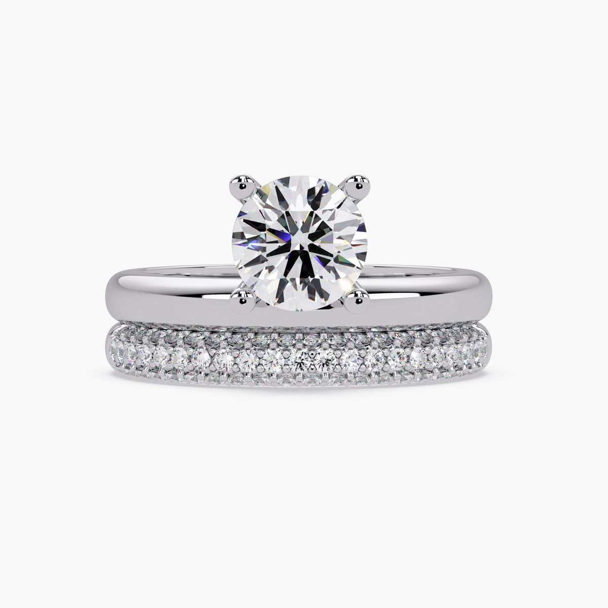 Round lab grown diamond engagement ring set in 14K white gold with matching pavé band