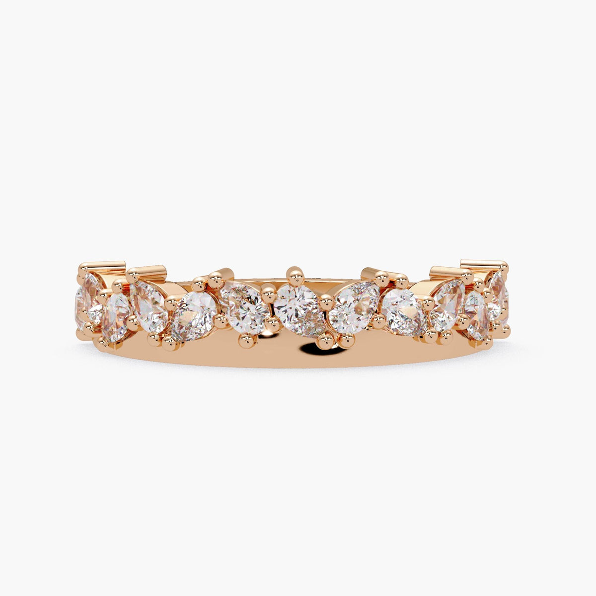 A gold ring with a row of small, clear diamonds set in the band.