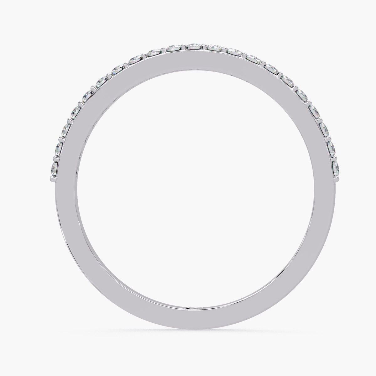 A silver ring with a row of small diamonds along the edge.
