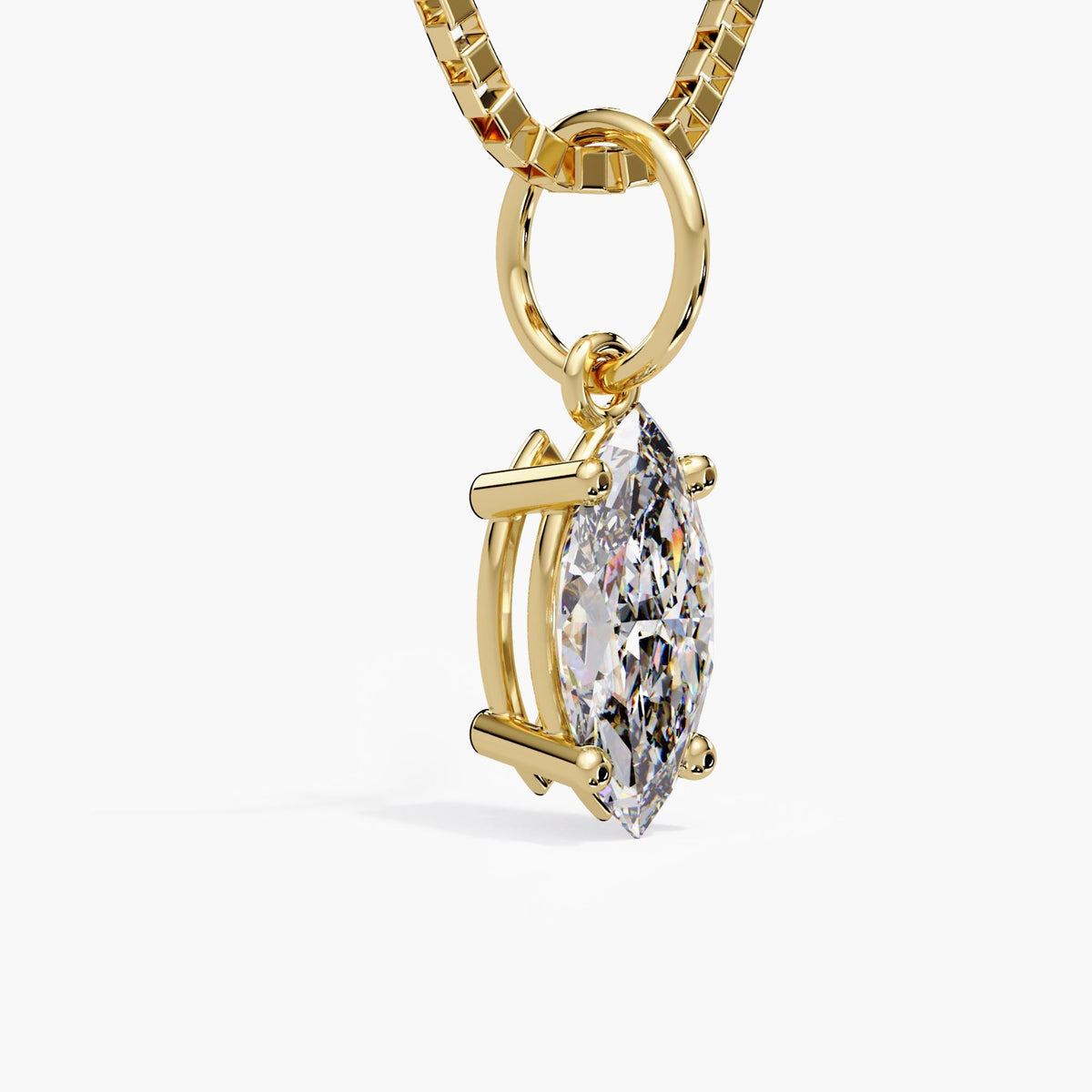 14K gold marquise cut diamond pendant showing prong setting