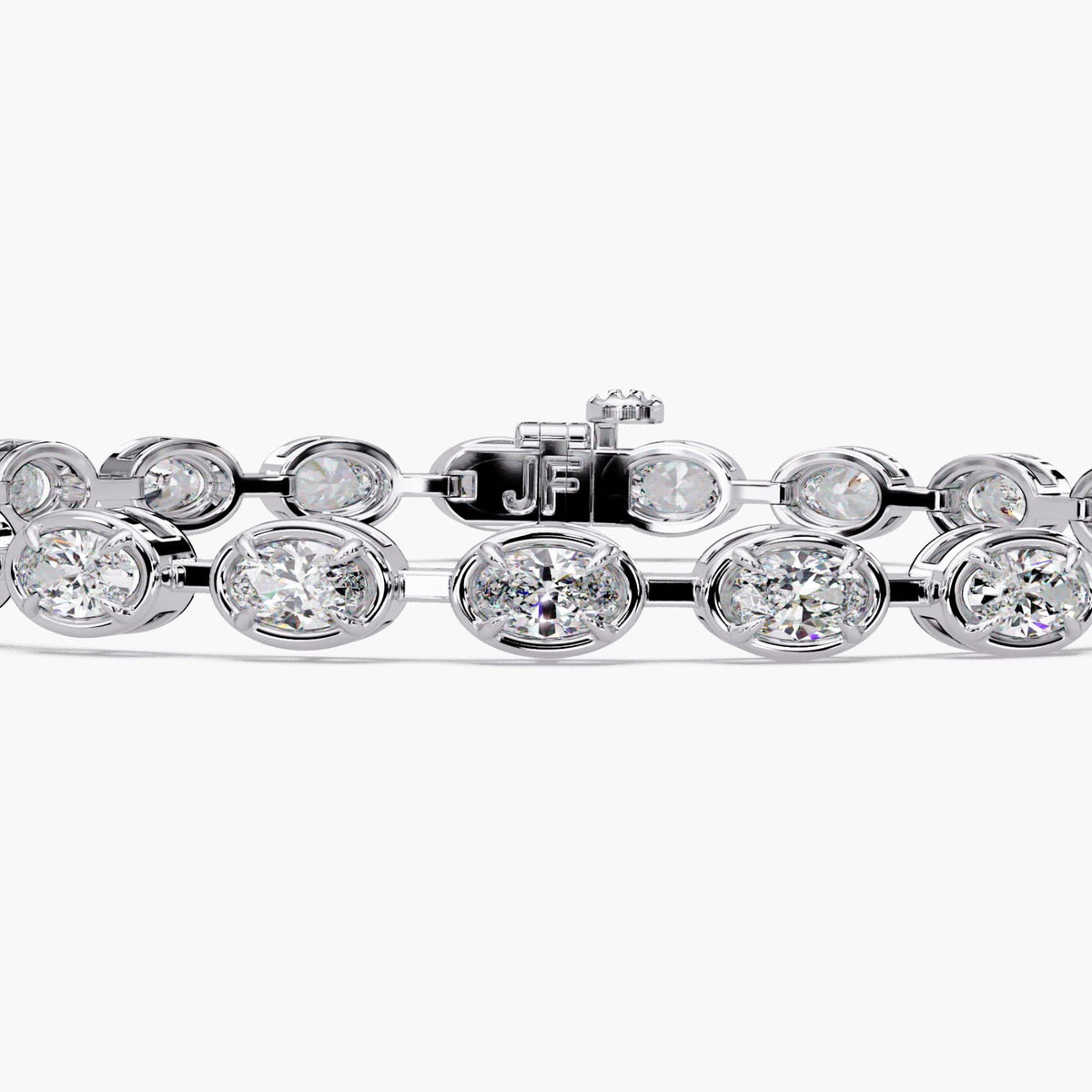 White gold oval diamond tennis bracelet featuring VVS+ lab grown diamonds