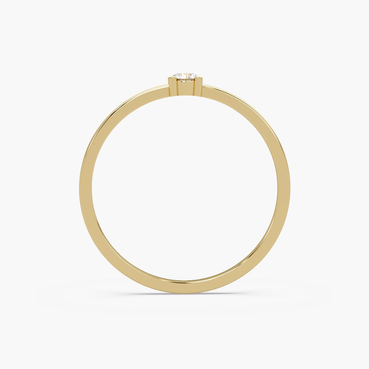 Classic four-prong round natural diamond solitaire ring in 14K yellow gold