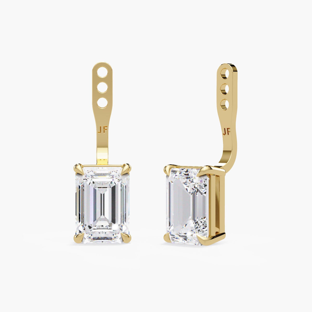 Pair of yellow gold emerald-cut lab-grown diamond earring jackets with claw settings and three adjustment holes.