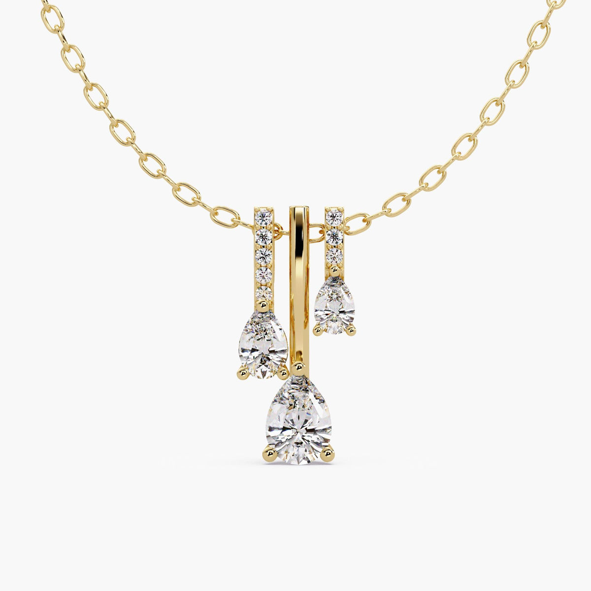 14K yellow gold triple pear lab-grown diamond drop necklace with three graduated pear diamonds and round pavé accents.