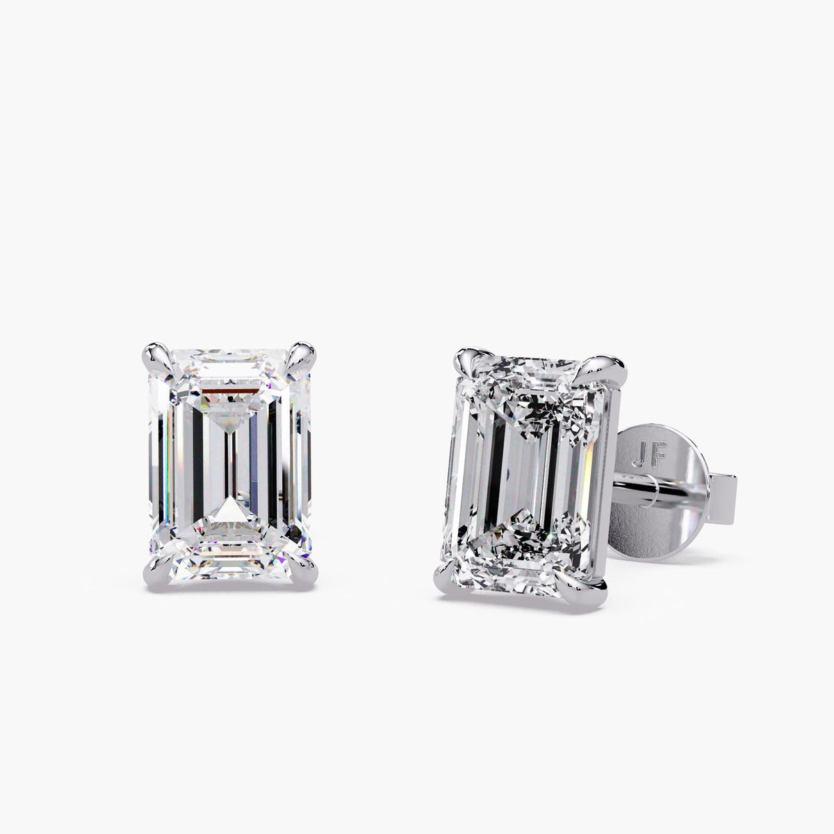 Emerald cut lab grown diamond solitaire stud earrings in 14k white gold with claw settings and pushback closures, IGI certified diamond earrings for women in 1 to 4 CTW