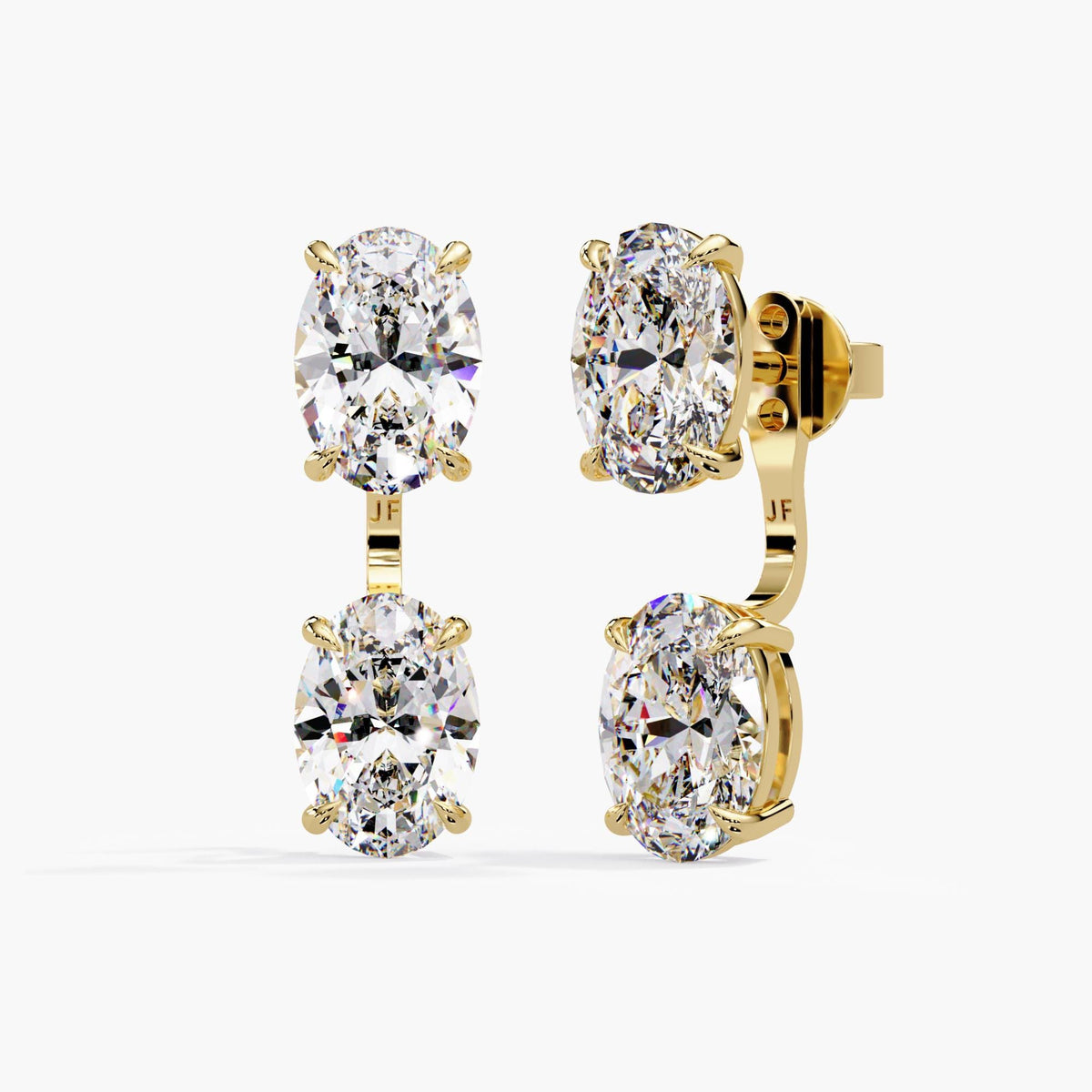 14K yellow gold oval lab-grown diamond earring jackets paired with solitaire studs to create an adjustable double-diamond drop earring design.