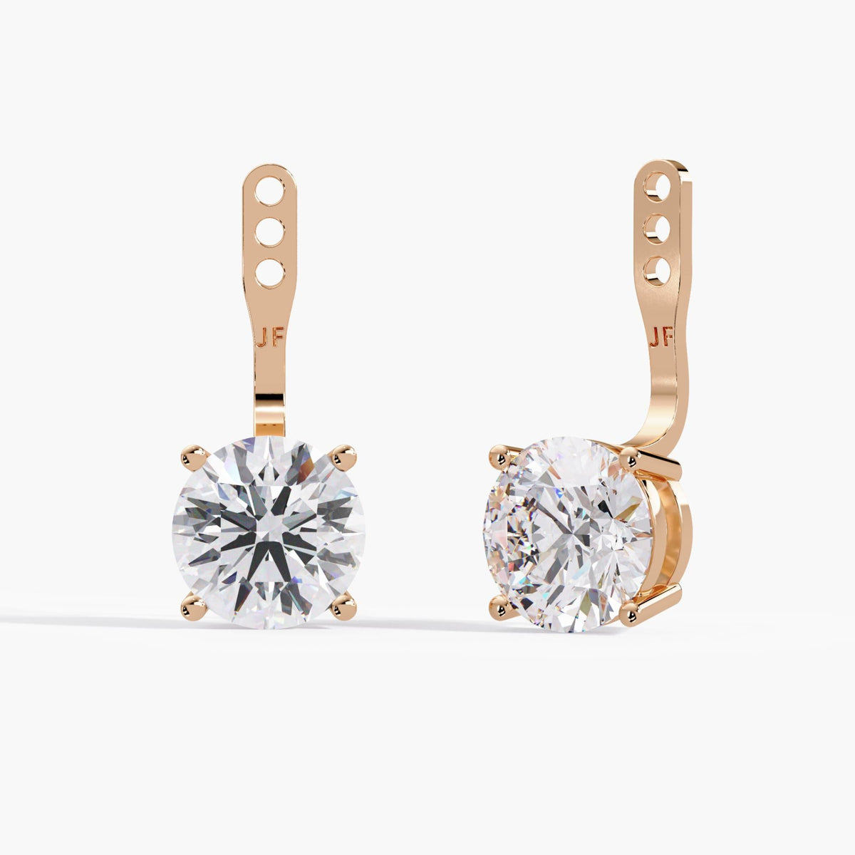 Transform your favorite stud earrings into diamond drop earrings with these adjustable 14K rose gold earring jackets, each featuring a round lab-grown diamond.