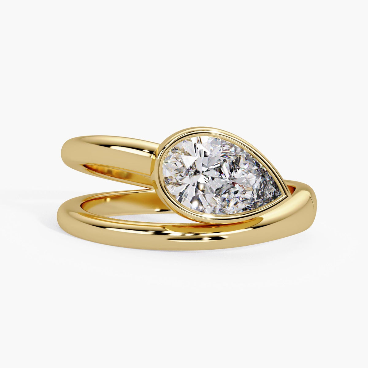 1 CT lab-grown pear diamond ring / east-west bezel setting / 14K yellow gold bypass band / modern engagement or pinky ring