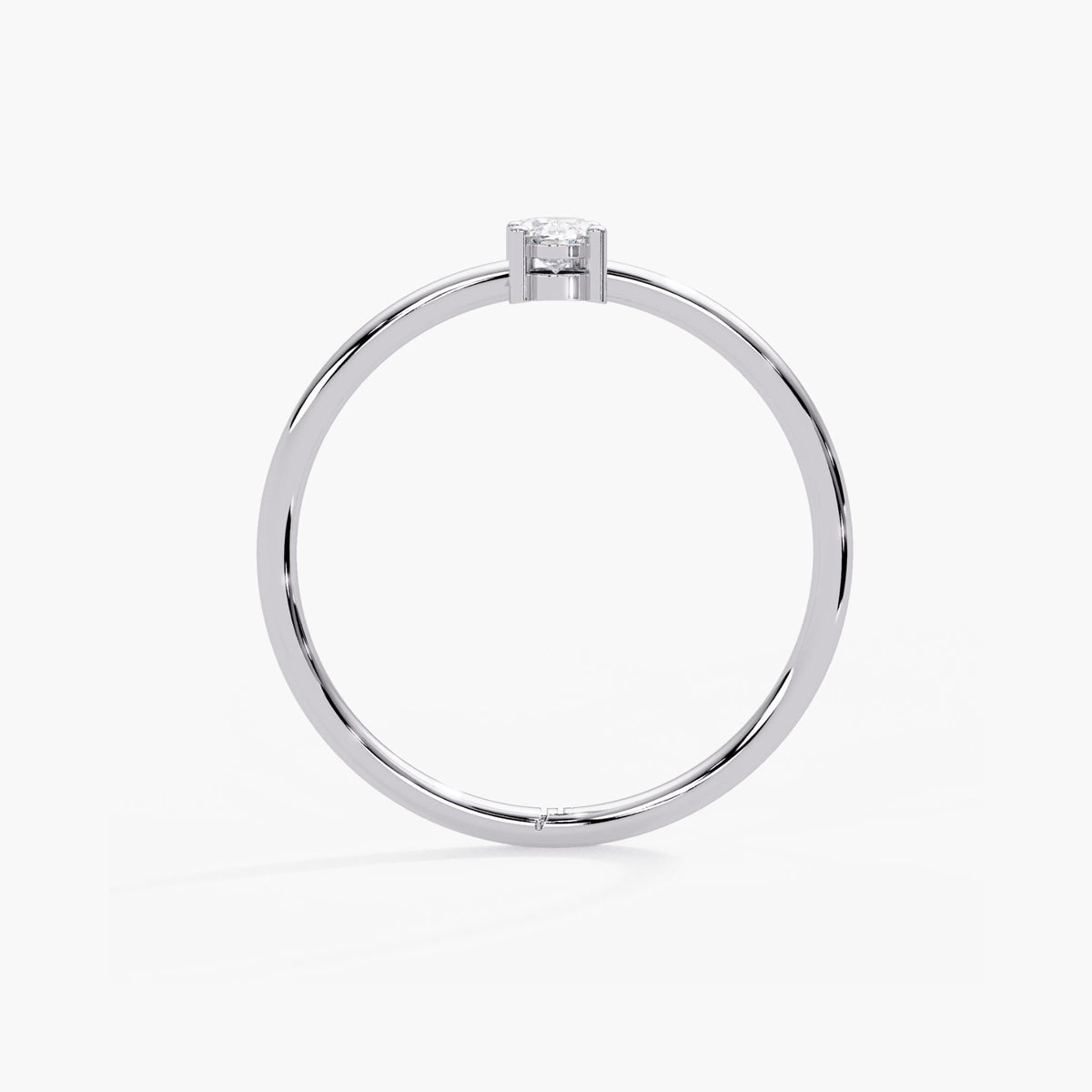 14k white gold oval and round diamond ring with a smooth round wire band in a comfortable slim width.