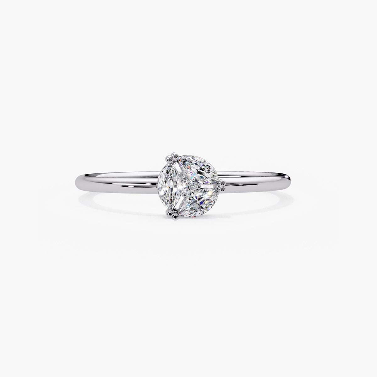 14k white gold marquise diamond cluster ring, three lab grown marquise around a round center on a dainty band.