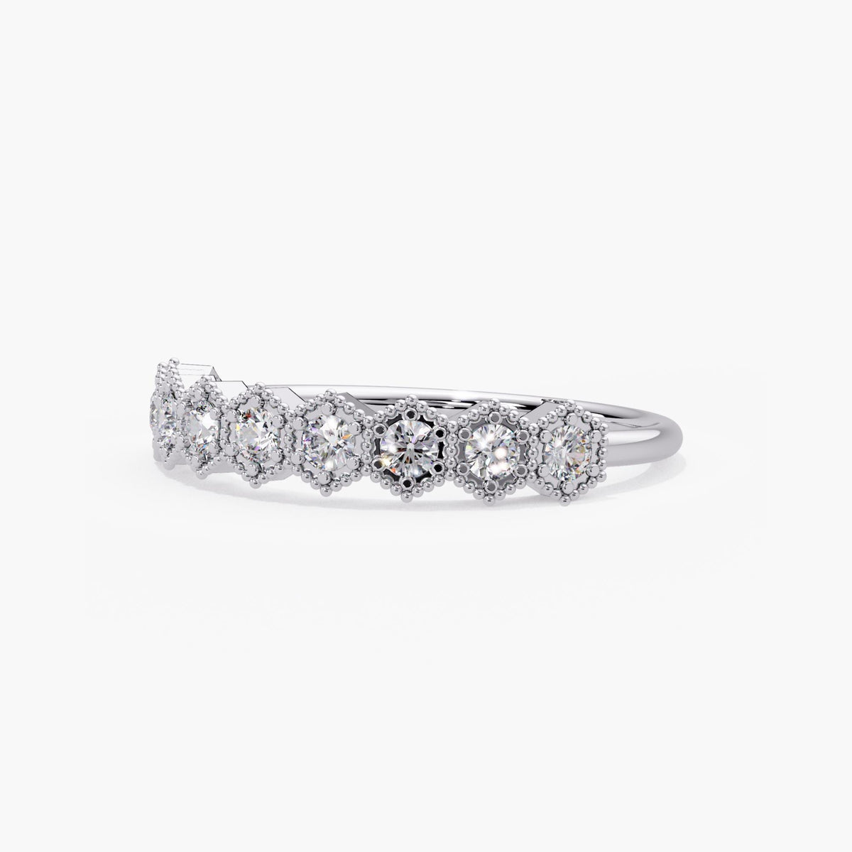 Vintage-inspired white gold diamond stacking ring with nine natural diamonds and delicate beaded detailing.