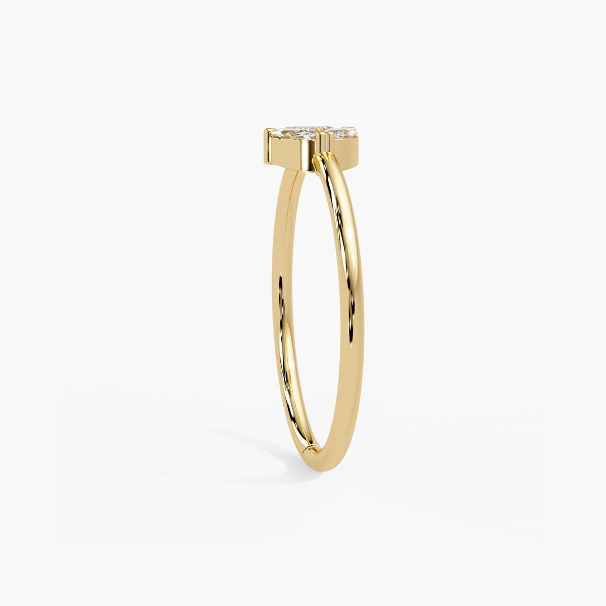 14k gold marquise cluster ring with a slim 1.35mm band and low stone profile for everyday stacking.