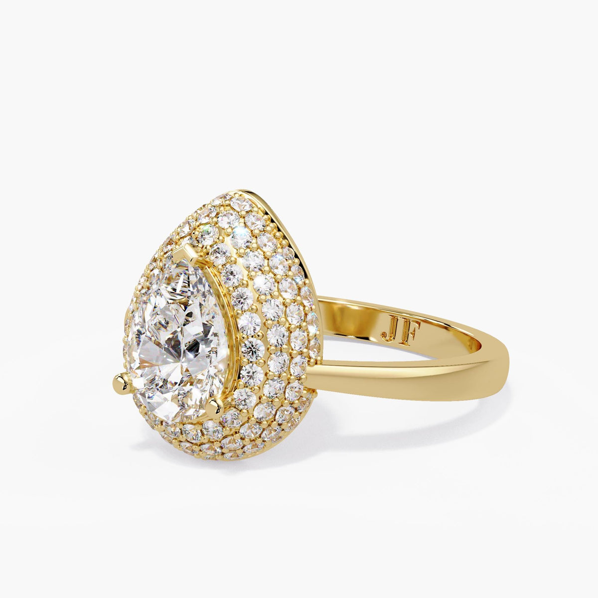 Pear diamond halo ring in 14K yellow gold, showing the curved pavé setting, raised pear center, smooth band and Jewel Frost initials inside the shank.
