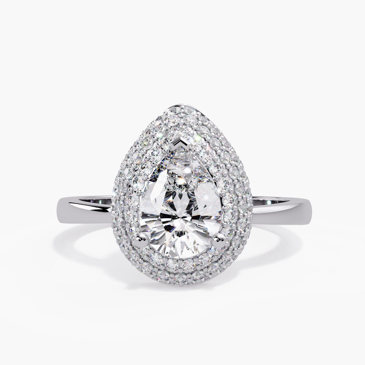 14K white gold pear lab grown diamond ring with a round brilliant pavé halo following the teardrop shape and a smooth polished band.