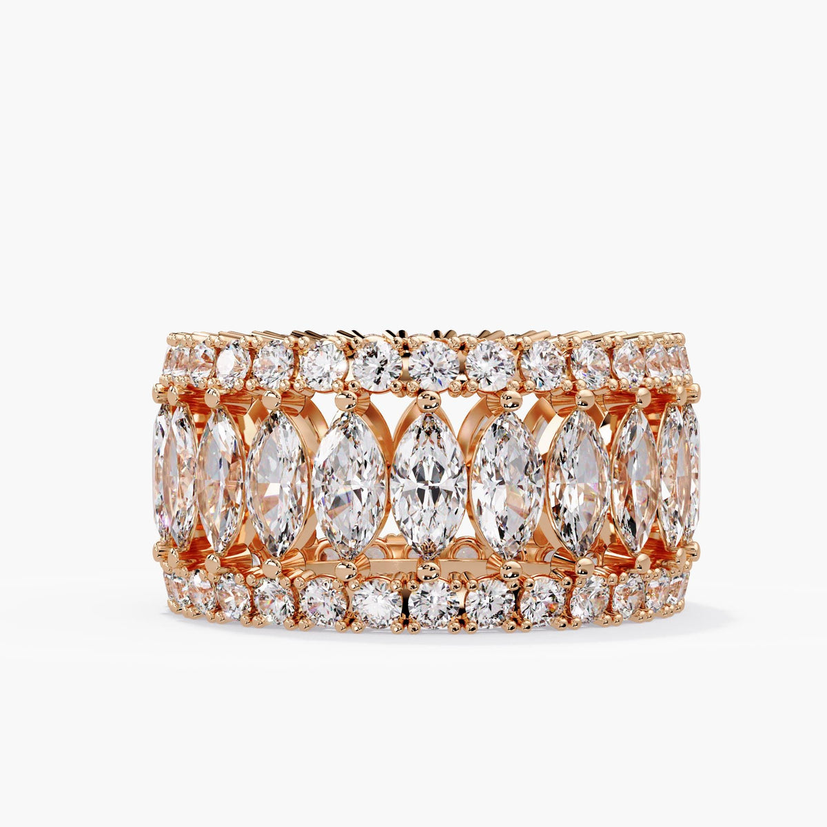 Wide wedding band in 14K solid rose gold with a central row of marquise lab grown diamonds, round diamond borders and warm polished gold between the stones.