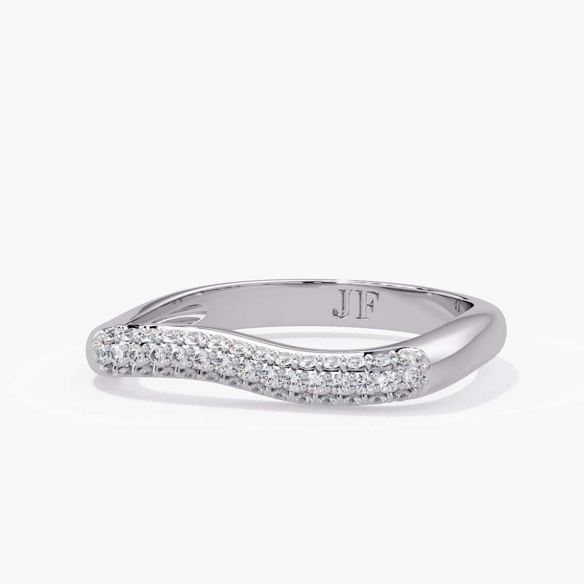 Stackable natural diamond ring in 14K white gold, angled to show the wavy pavé front, polished inner band and engraved JF lettering.